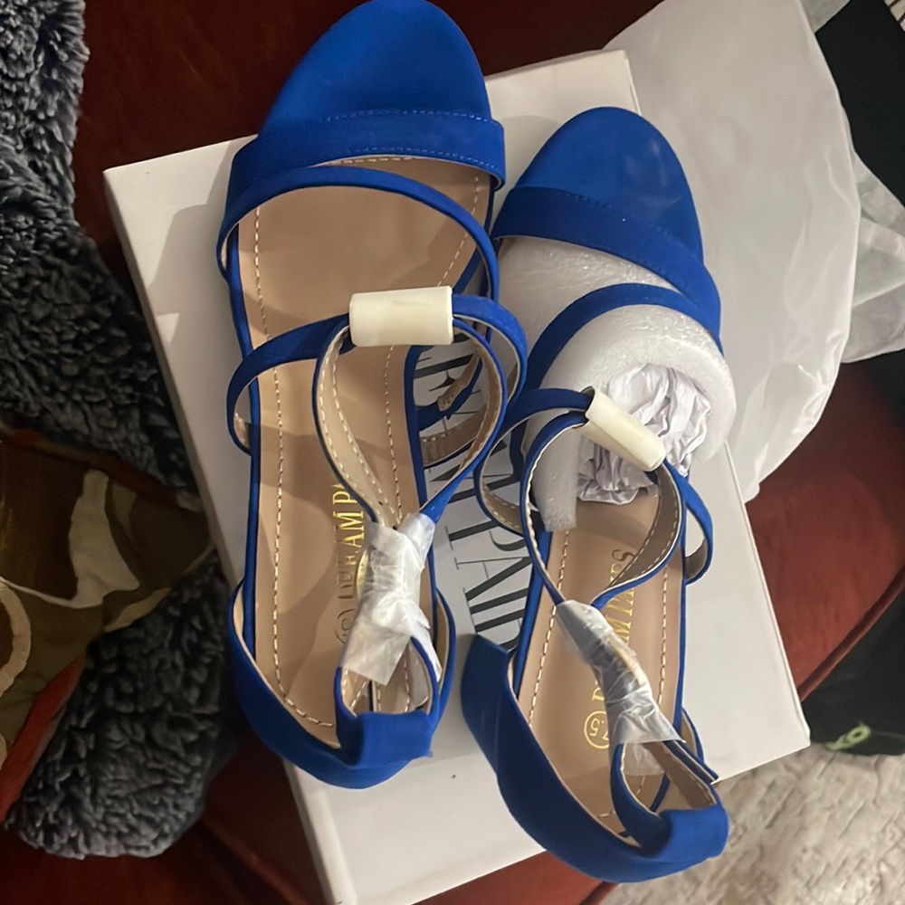Brand new blue heels never worn size 7.5